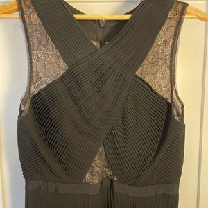 Gorgeous, excellent condition black BCBG gown. Bottom is pleated and flowy.